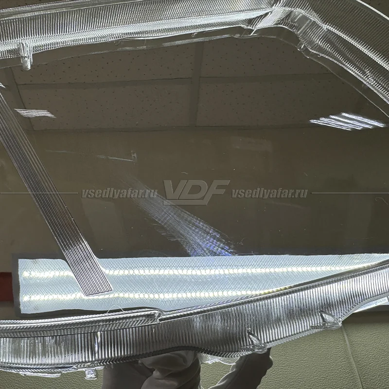 Уцененное стекло для фары Toyota Hilux (2011-2015) Правое №7