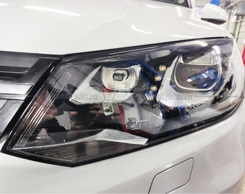 Стекло для фары Volkswagen Touareg (2010-2014) Левое