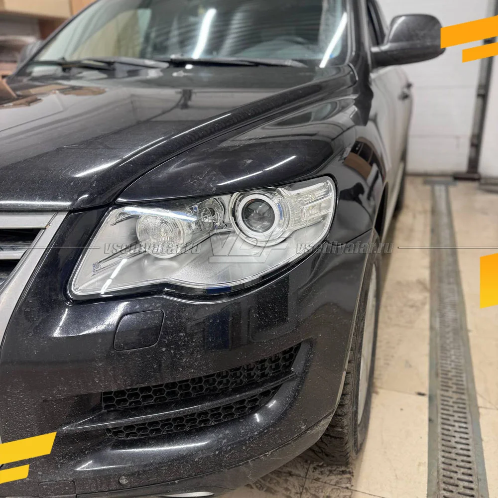 Стекло для фары Volkswagen Touareg (2006-2010) Левое