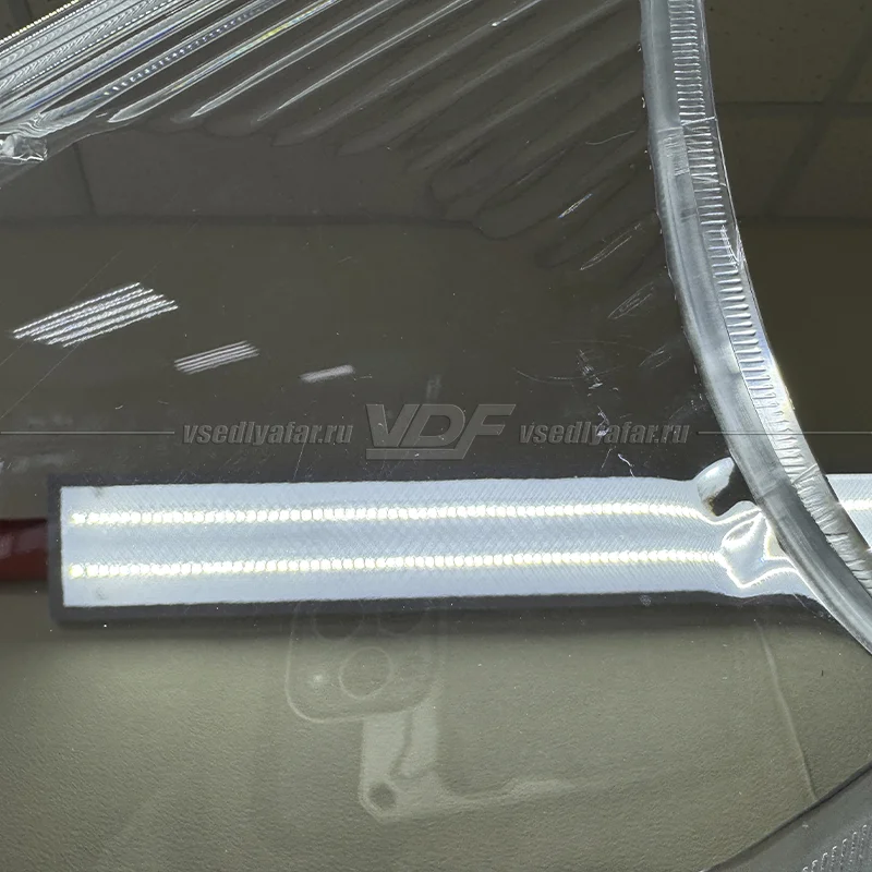 Уцененное стекло для фары Mitsubishi Grandis (2004-2009) Левое №2
