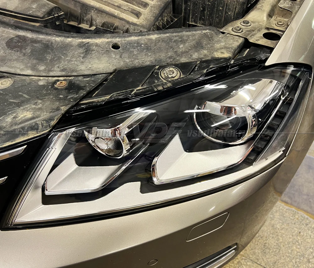 Стекло для фары Volkswagen Passat B7 (2010-2015) Левое