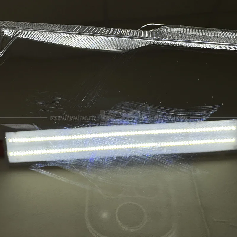 Уцененное стекло для фары Mitsubishi Pajero III (2000-2006) Правое №5
