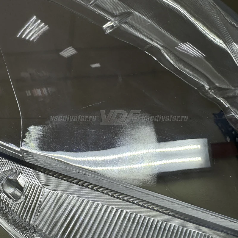 Уцененное стекло для фары Toyota Hilux (2011-2015) Правое №14